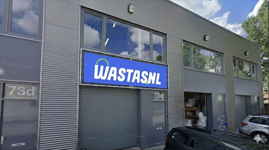 Wastas premises on Henricuskade 73E in The Hague with the blue WASTASNL logo above the entrance